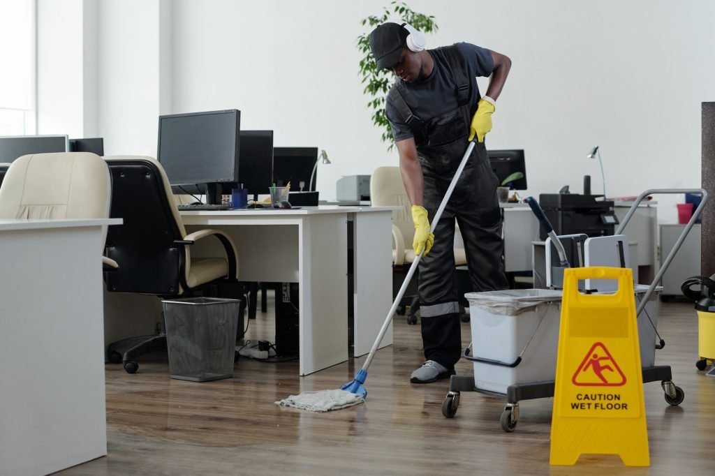 Men cleaning the floor in an office-eves cleaning utah